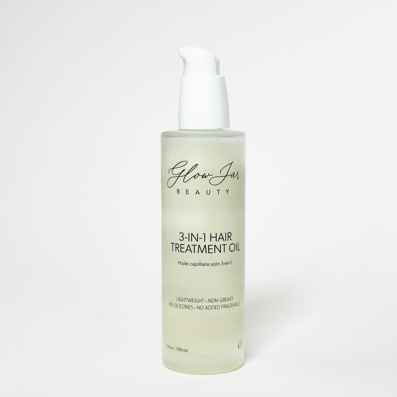 Glow Hair Beauty 3-in-1 Hair Treatment Oil bottle on a white background
