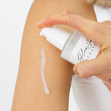 Glow Jar Beauty Barrier Body Serum application on arm