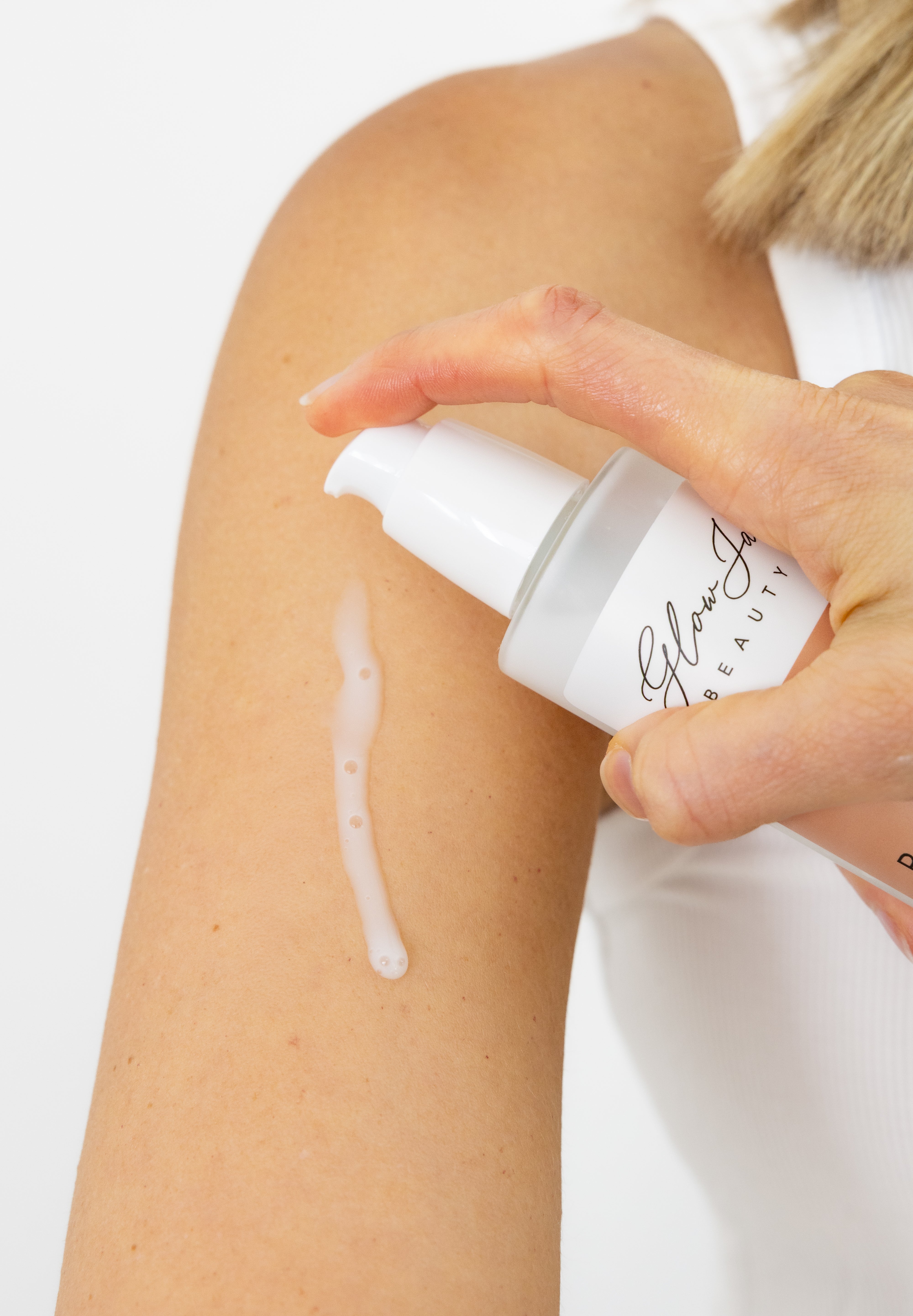 Glow Jar Beauty Barrier Body Serum application on arm