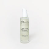 Glass bottle of 3-in-1 hair treatment oil on a white background